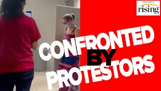 Sinema STALKED In Bathroom By Protestors, Progressives STAND THEIR GROUND To Pass Reconciliation