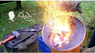 Homemade forge out of two buckets and the fan forge