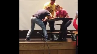 Arm-Wrestling During an Assembly