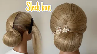 Sleek low bun. Very easy technique!