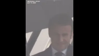 France’s Macron arrived for Japan G7, carrying rib-detached umbrella