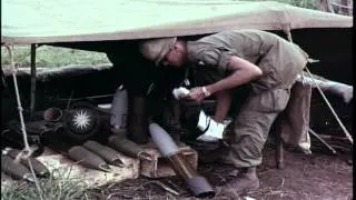 Soldiers of 101st Airborne Division load and fire 105mm howitzer during Operation...HD Stock Footage