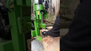 Goliath 20 ton log splitter making big bits of wood smaller