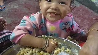 Baby first time eating rice with his own hand