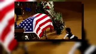 Heartbreaking photo shows boy in front of father's casket