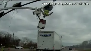 WATCH: Truck crash sends worker flying out of construction bucket