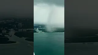 WATER SPOUT FROM PLANE