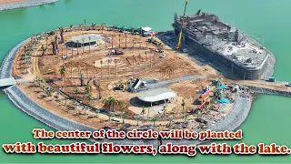 2187,The center of the circle will be planted with beautiful flowers, along with the lake.