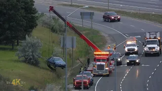 Etobicoke: Heavy crane towing car out of a ditch after freeway mvc 7-4-2022