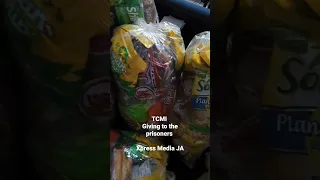 Trumpet Call Ministries International giving to the prisoners at Montego Bay Police lockup.