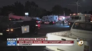 SDPD Officer injured, SWAT standoff underway