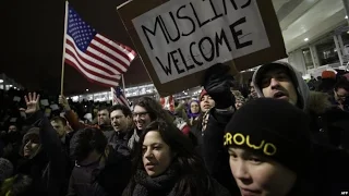 США: демонстрации против исполнительных указов о мигрантах