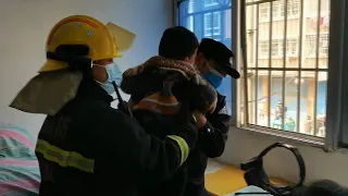 GLOBALink | 4-year-old boy rescued after getting stuck inside washing machine in E China