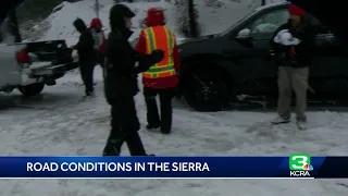 Snow blanketed Sierra roads create slip and slide conditions