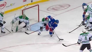 Jimmy Vesey makes a falling backhander look easy