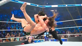 Riddle hits an RKO out of nowhere on Roman Reigns