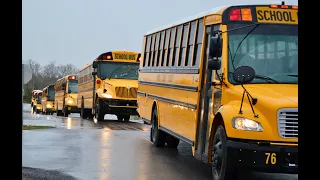 Massive school bus procession honors Hawkins driver who was killed in crash