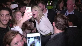 Taylor Swift and Gigi Hadid causes chaos as they get out of the Tommy Hilfiger Fashion Show