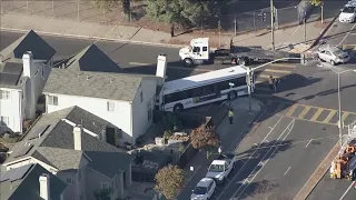 AC Transit bus plows into Oakland home after being struck by stolen vehicle