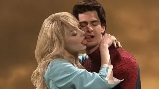 Andrew Garfield gets kissing lesson from Chris Martin as he hosts SNL... and Emma Stone helps too