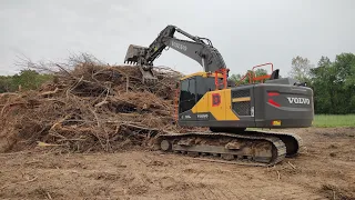 Stacking Up All The Clearing Into Massive Burn Piles