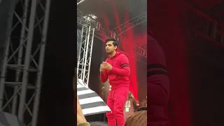 Jay Kadn (Junai Kaden) singing has shoe thrown at him