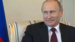 Vladimir Putin reappears in public for first time in 10 days