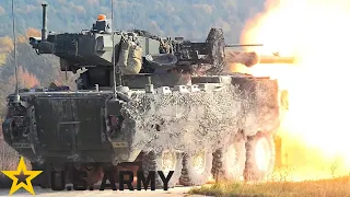 US Army, Firepower. Stryker M1128 MGS armored vehicle with tank gun in action.