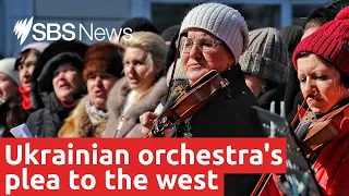 Ukrainian orchestra holds open-air concert in city of Odesa to call for a no-fly zone | SBS News