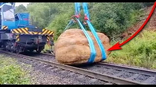 How did he get there? A giant stone weighing 16 tons on railway rails!