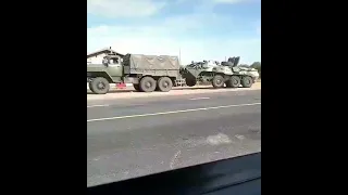 Ural 4320 during the transport of a broken armored personnel carrier of the Russian Army