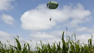 Mass parachute jump over Normandy kicks off D-Day commemorations - but Putin is not invited