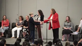 Simon receives his 8th grade diploma