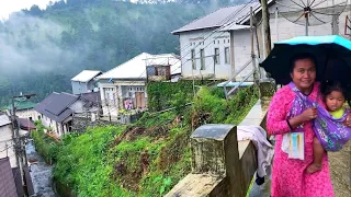 Rain in a beautiful village on a cloud hill||Indonesian rural atmosphere