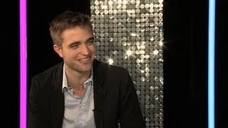 Robert Pattinson reveals all about getting intimate with Kristen...