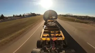 A day in a life of a heavyhaul truckers/hauling a massive wind turbine tower section from Shelby MT