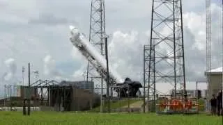 SpaceX Falcon rocket is erected vertical on the launch pad for Dragon CRS-1 mission to ISS