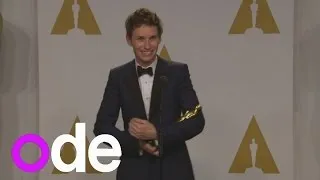 Oscars: Eddie Redmayne cradles and rocks figurine like a baby in winners' room!