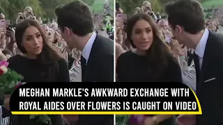 Meghan Markle’s awkward exchange with royal aides over flowers is caught on video | Viral Video