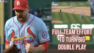 Cardinals turn a wild inning-ending double-play, a breakdown