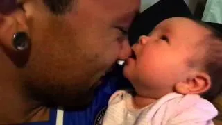 Baby Scarlett thinks Dad's nose is a nipple!