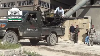 Anti-aircraft gun ZU 23-2 on the basis of a pickup truck is firing direct fire