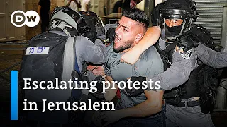 Hundreds injured in clashes at Jerusalem's Al-Aqsa mosque | DW News