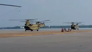 CH-47 Chinook taxiing, one hovering