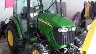 John Deere 3520 snowblowing