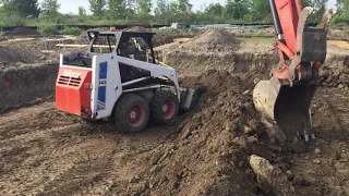 My 743 bobcat skid steer moving dirt