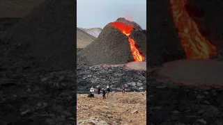 Daredevils Play Volleyball Beside Erupting Volcano