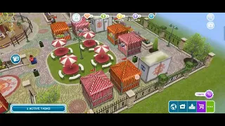 Game: The Sims FreePlay Mission: Building game Carousel, Ferris Wheel, High Striker, Jumping Castle