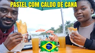 LEVEI ELA PRA PROVAR O FAMOSO PASTEL BRASILEIRO🇧🇷 COM CALDO DE CANA