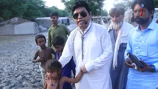 Flood Relief Distribution in Nowshera, KPK Area by Bishop Dr. Tariq John and Joshua TV